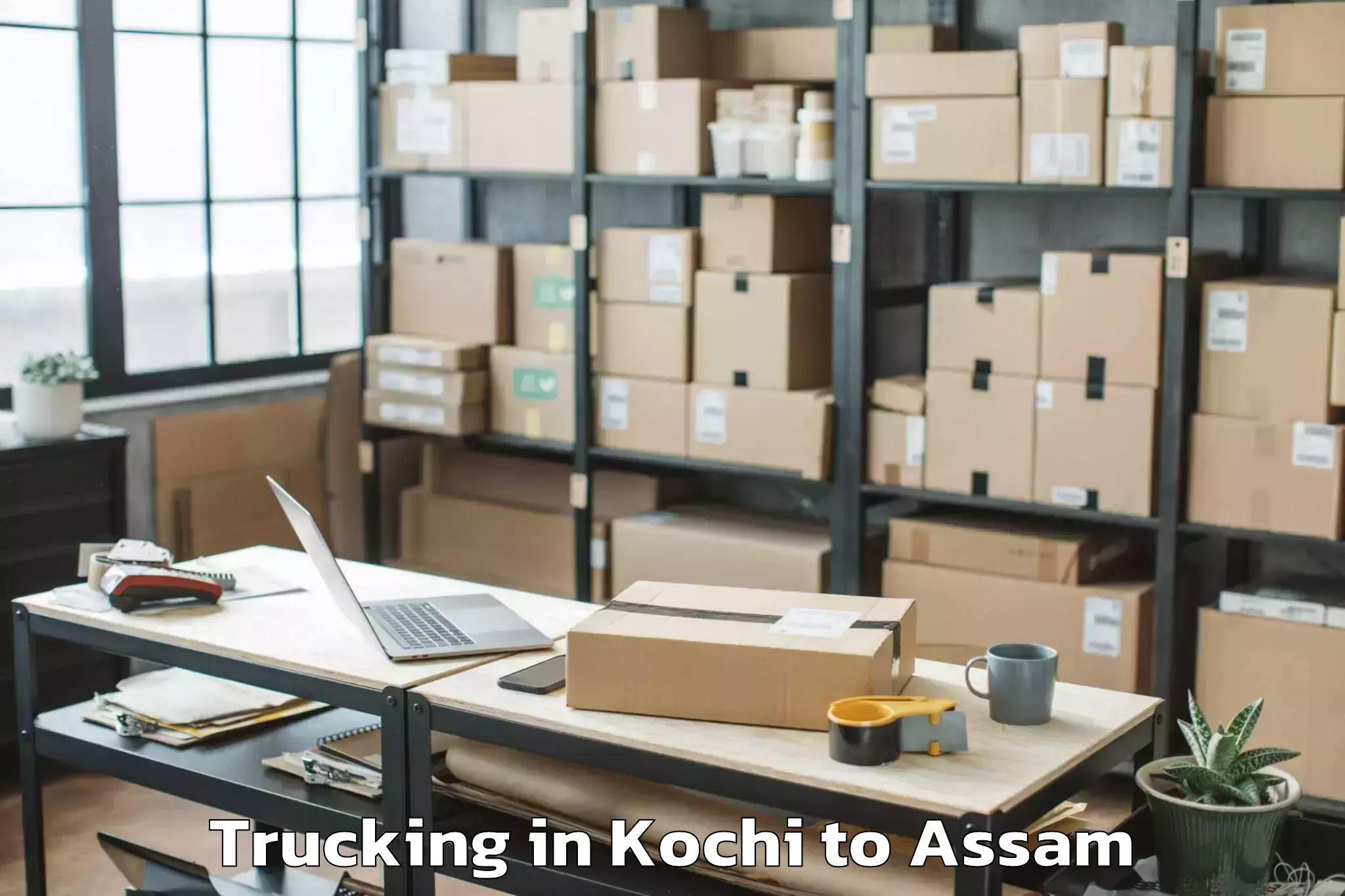 Easy Kochi to Pachim Nalbari Trucking Booking